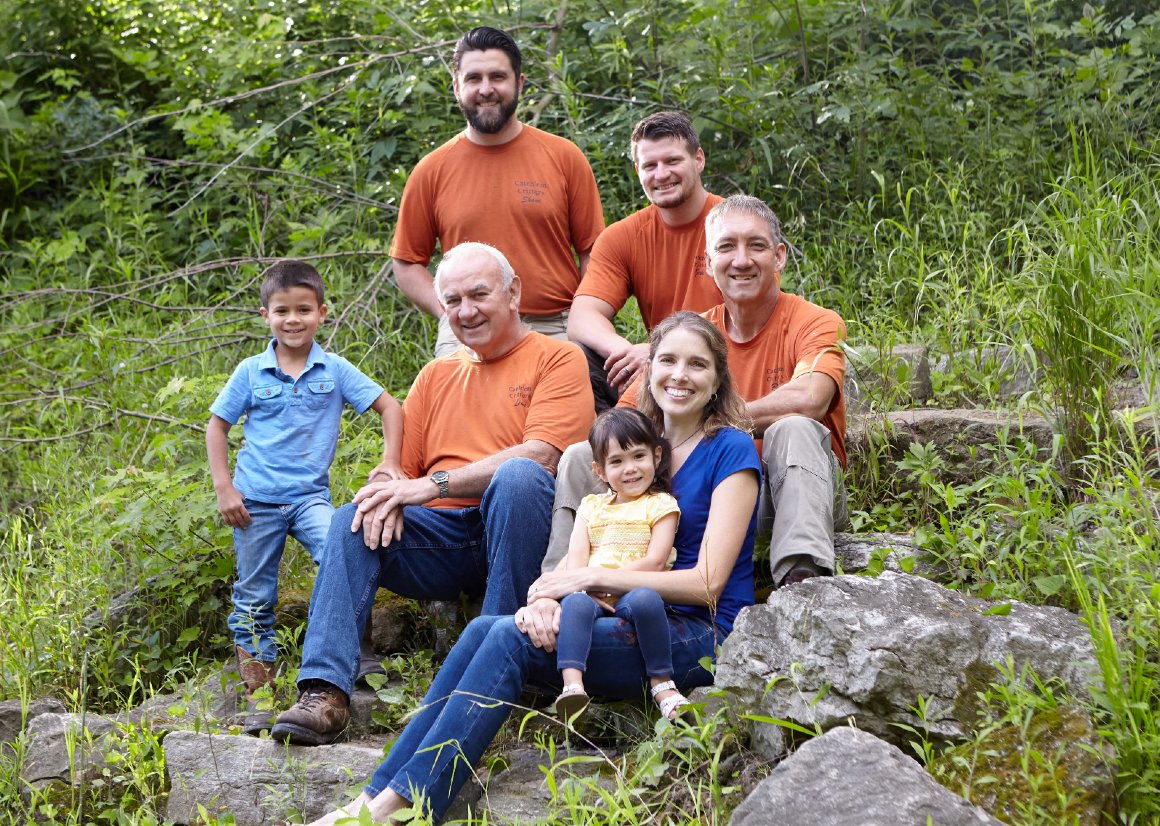 Shane Schwartz, Jake O'Donnell, Leon Stutzman - Technicians (top, right, and center); Ben and Liebe Stutzman - Owners (far right) with children Caleb and Lydia